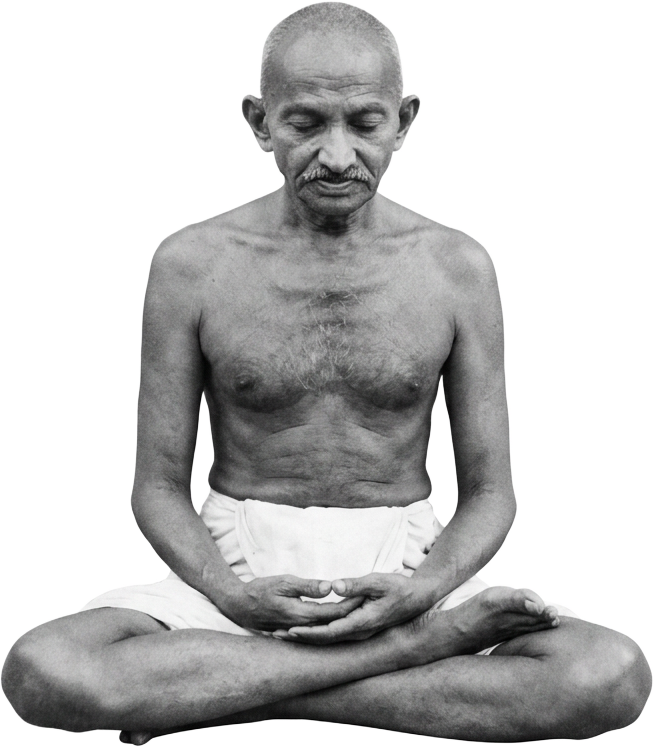 Mahatma Gandhi seated cross-legged in meditation